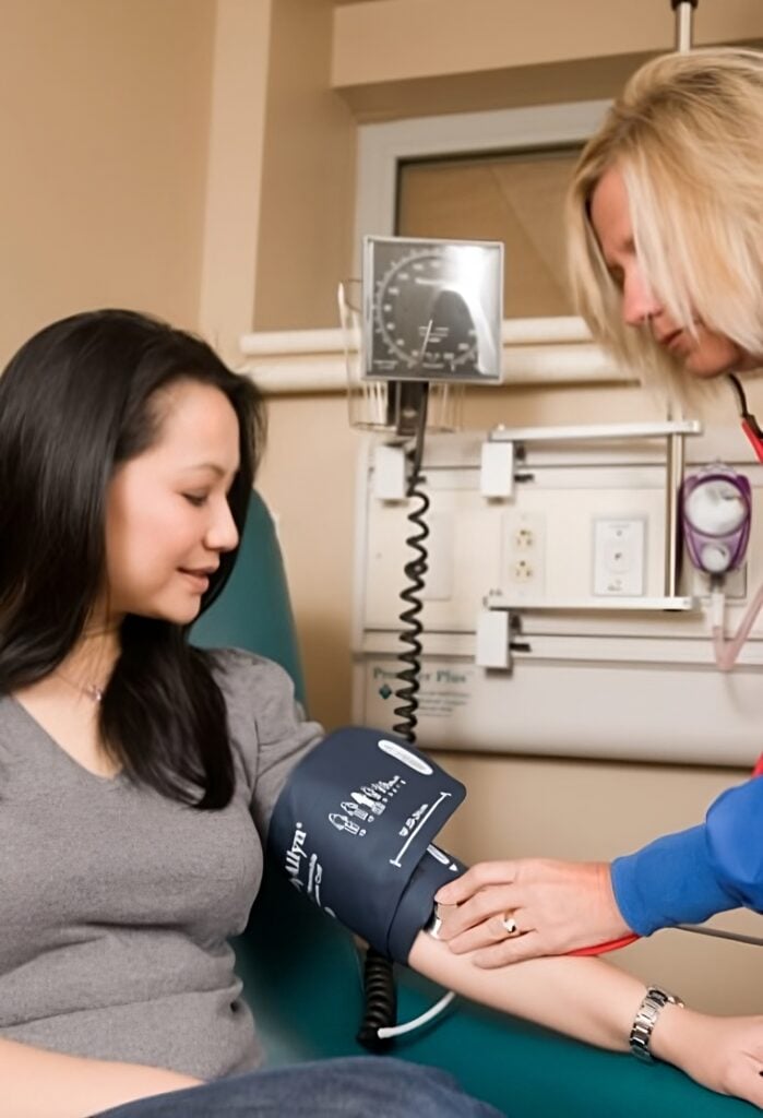 Women checking blood pressure.