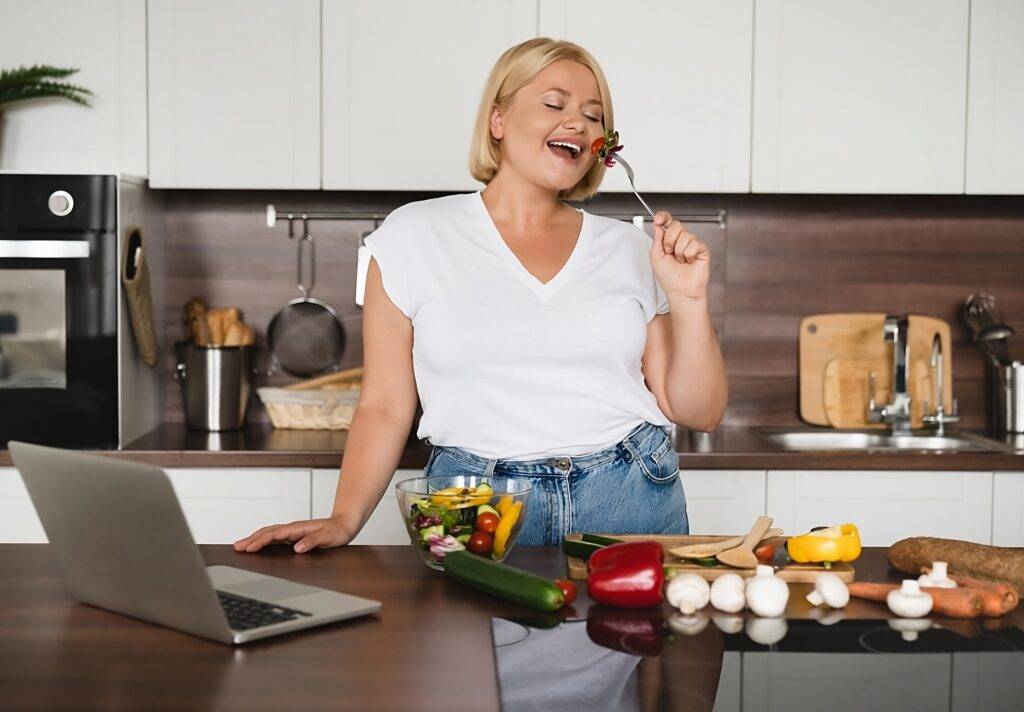 Woman in kitchen.