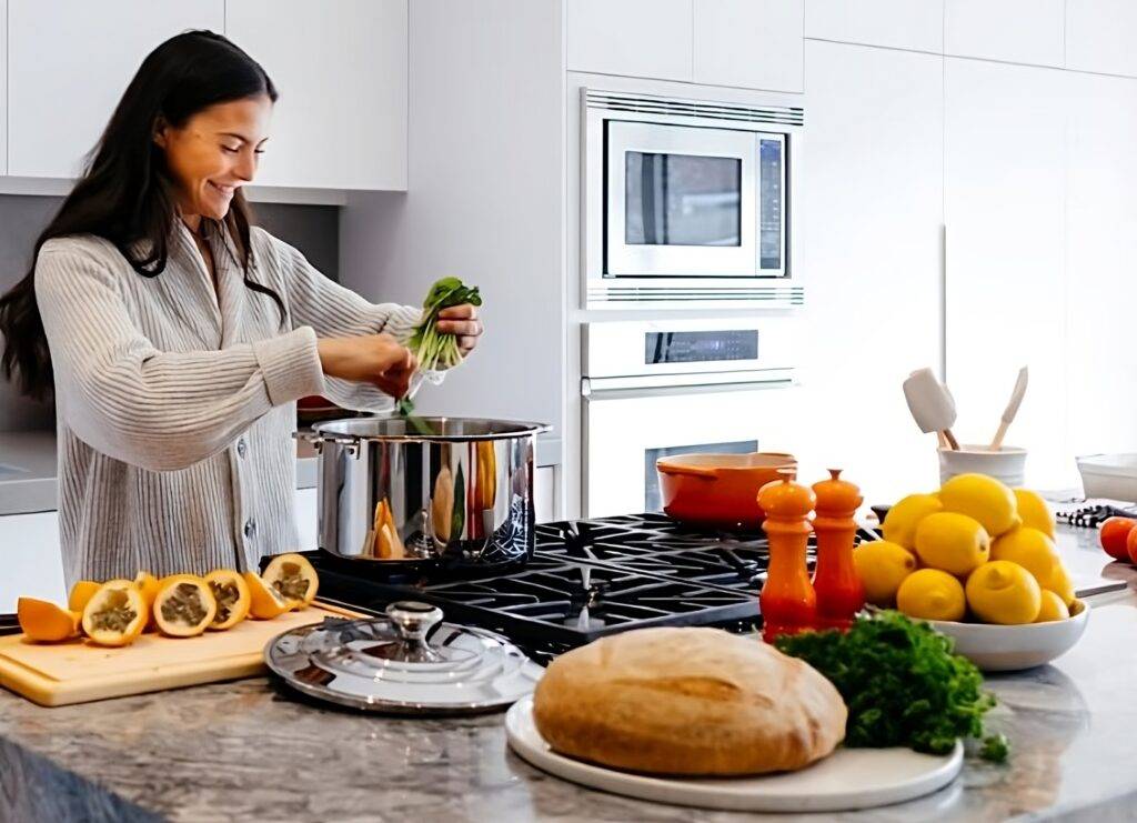 Healthy woman preparing meal.