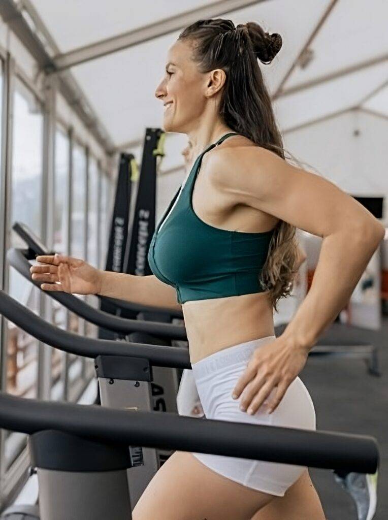 Woman exercising to keep a tone neck and face.