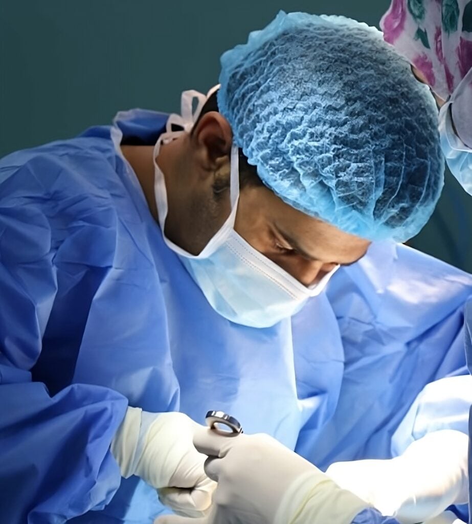 A hepatologist operating on a patient with fatty liver disease.
