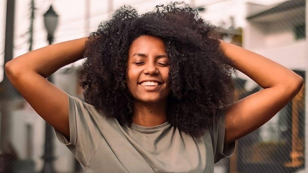 Woman celebrating her weight loss.